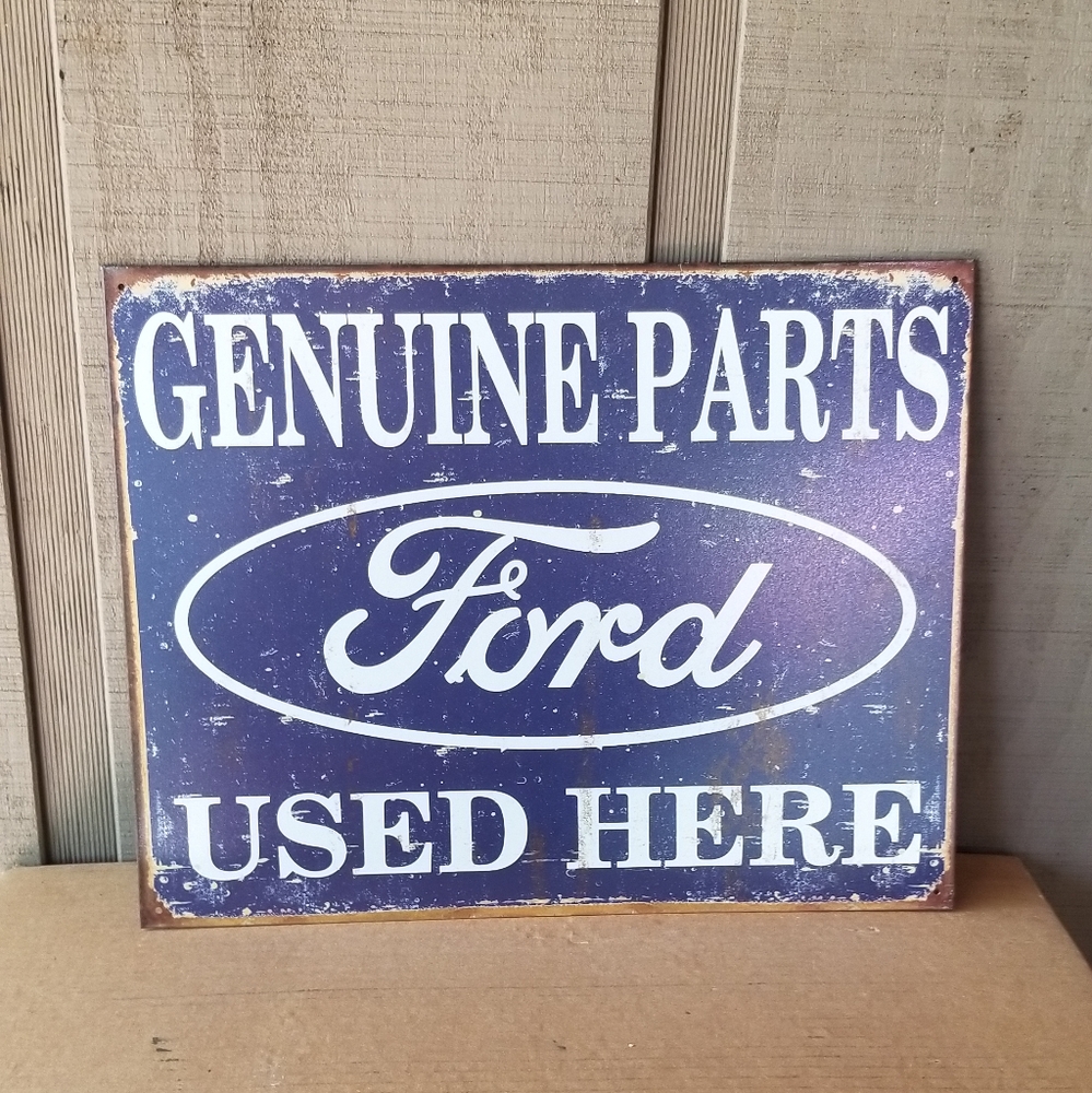 Ford Parts sold here tin sign